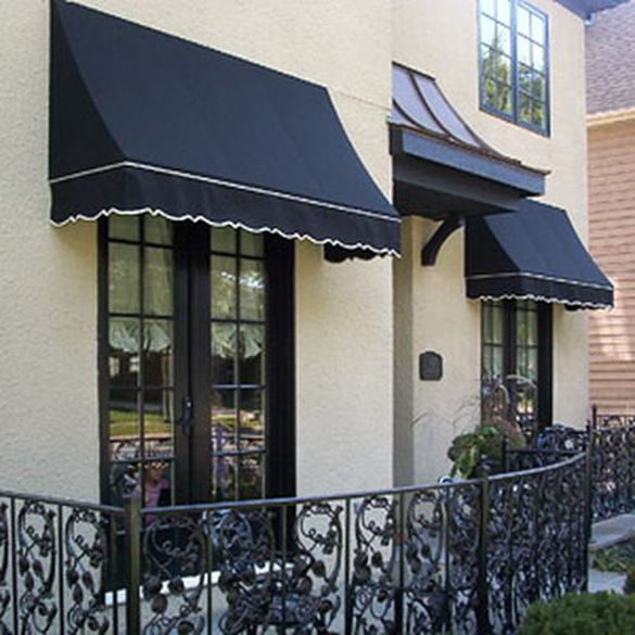 black awnings over french doors