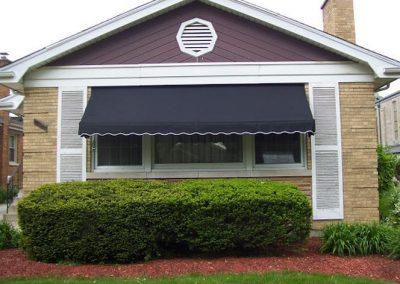 black window awning on home in Des Plaines, Illinois